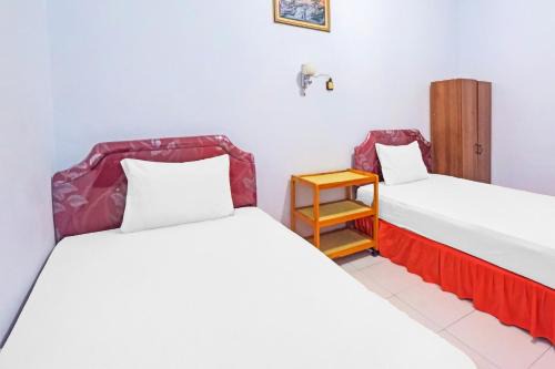OYO 92337 Wisma Arwini Syariah Near Benteng Balangnipa