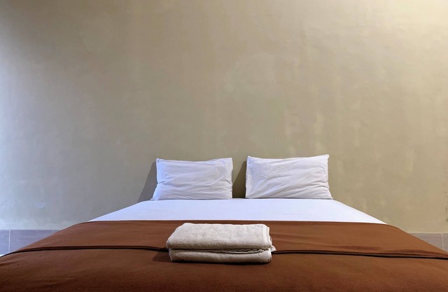 OYO 93876 Athirah Kost Near Permandian Wisata Istana Mappala