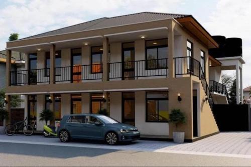 OYO 94244 Ezhar Boka Homestay Near GOR Sulis Bulutangkis