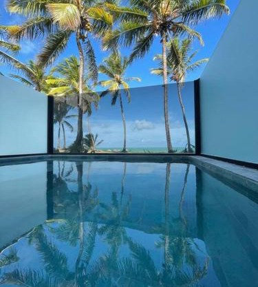 Pé na areia c/piscina privativa.