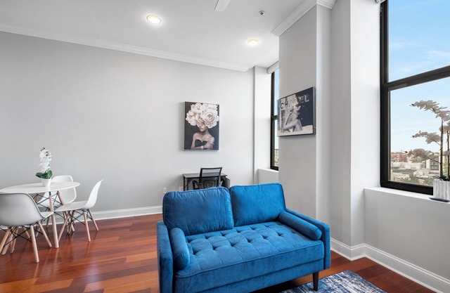 Palatial 1BR w/ Rooftop Pool