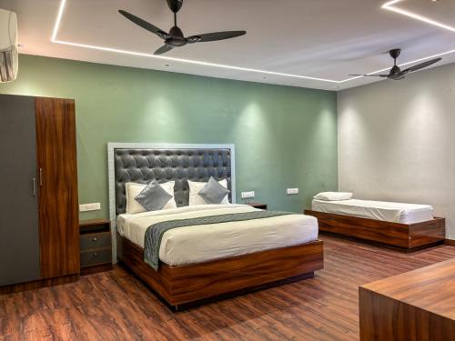 Palm Mystic Inn - Indiranagar