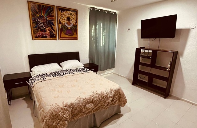 Casa palmeritas con una habitación, terraza y apta para mascotas