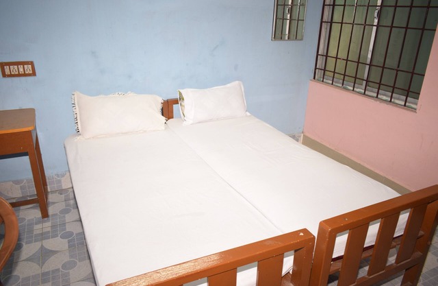 Parisha Residency - Temple Side Hotel