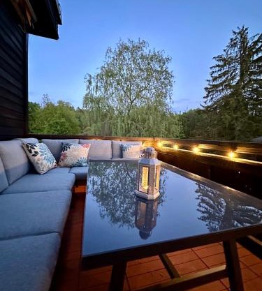 Pavillon Am Kurpark - Top bewertet von Familien! Zentral, modern, ruhig - mit Balkon, Grill, Parkplatz, Wallbox und inklusive Wäschepaket