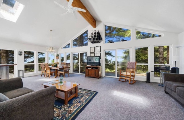 Peaceful 4BR Cape Meares Home | Ocean Views, Forest Setting, Wraparound Deck + King Bed