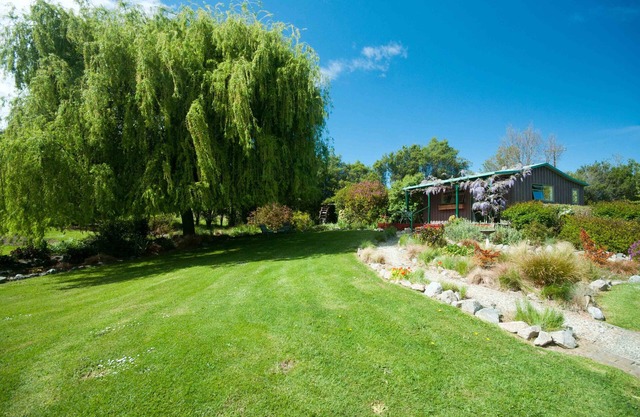 Tranquila y confortable cabaña en un hermoso jardín