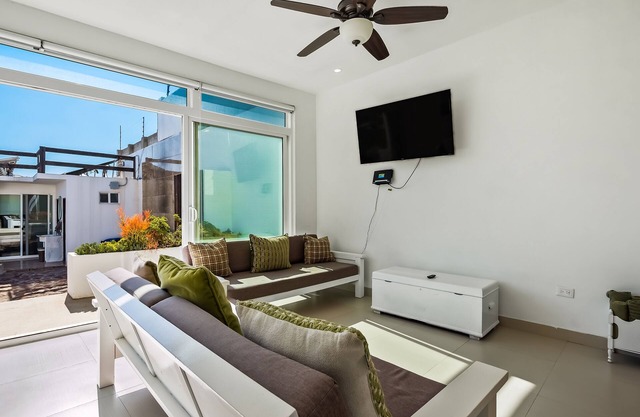 Peaceful dog-friendly villa with outdoor pool, rooftop patio, beach views, & AC
