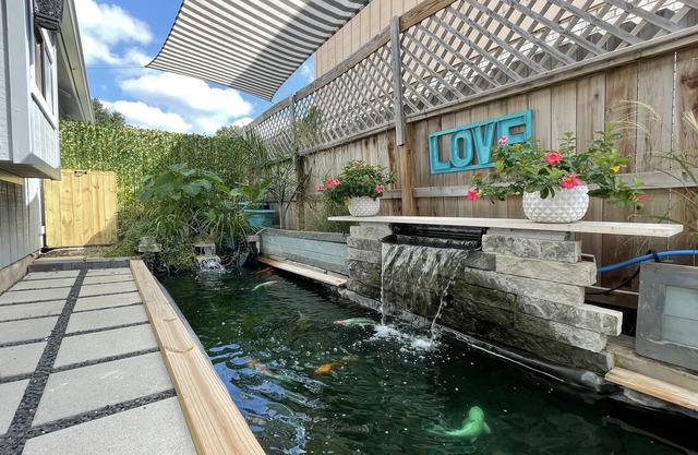 Urban Cascades boho chic 🏠 30’ private koi pond.