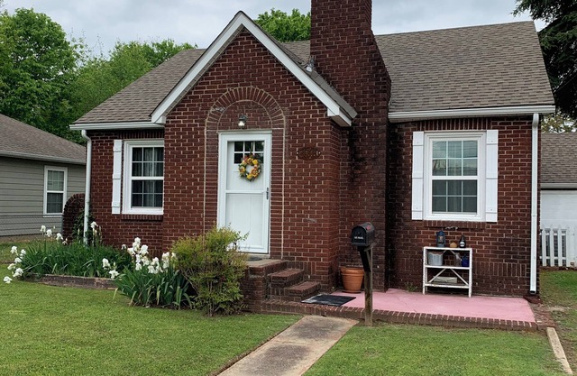 Peaceful home in town. Great location--walk downtown to stores and restaurants.