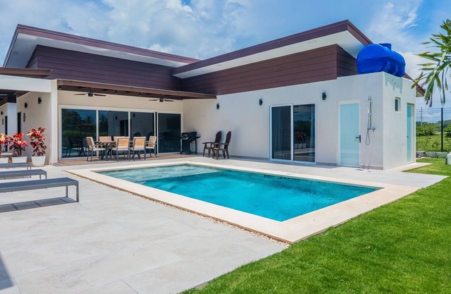 Peaceful home with patio, pool, grill, fast WiFi & 2-min walk to quiet beach