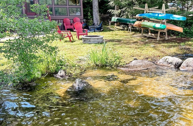 Peaceful lake front cottage w/large dock and sandy beach entry