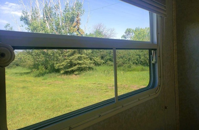Peaceful No Haul Trailer Vacation with Rockies View