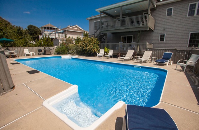 Peaceful oceanside home steps from beach with private pool & AC