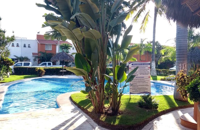 peacefull retreat with pool, nearby beaches within secure gated community.