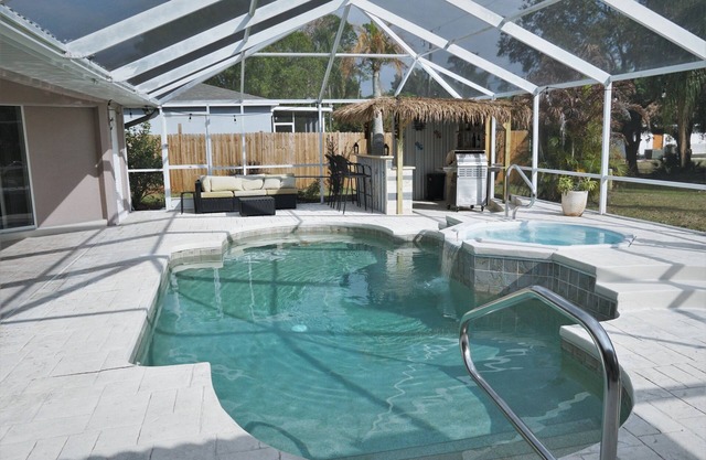 Peachland getaway with pool and tiki bar