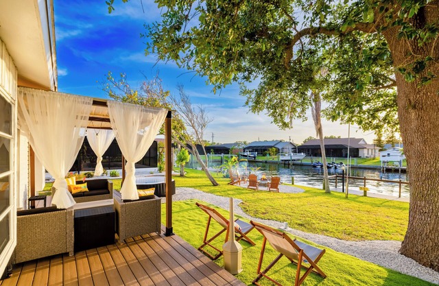 Pelican Lakefront Villa with Sunset Deck, Private Hot Tub, Games and BBQ