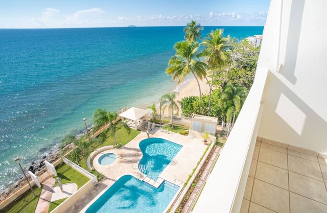 Pelican Reef 703 Beachfront Penthouse with Ocean and Sunset Views