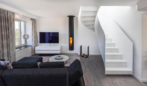 Penthouse mit Dachterrasse, Meerblick, Gasgrill, Klimaanlage, Kamin, Luxus-Design-Apartment, 2 Minuten zum Strand