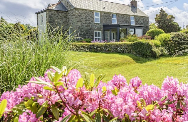 Perfect family house with sea views and large garden.