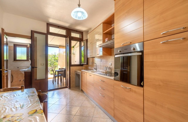 Apartamento que admite mascotas 'Domus Lucia - Tredomus' con jardín y aire acondicionado