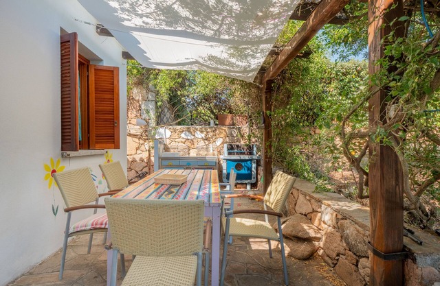Casa de vacaciones "Villa Idina" en Monte Petrosu con piscina compartida