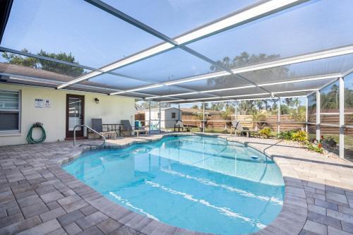 Pet-Friendly Retreat with Pool, Game Room & Fire Pit