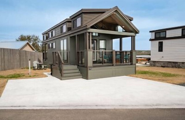 Pet-Friendly 'Salento Tiny Haus' Features Dual Porches, Solo Stove Fire Pit, and Multi-Purpose Dinin