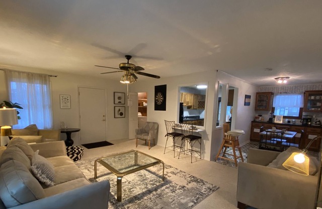 Pet friendly, spacious single level black and white themed home. Cozy Fireplace!