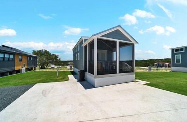 Pet-Friendly 'The June' Features French Doors to Screened Porch, Bunk Beds, and Multi-Level Layout w