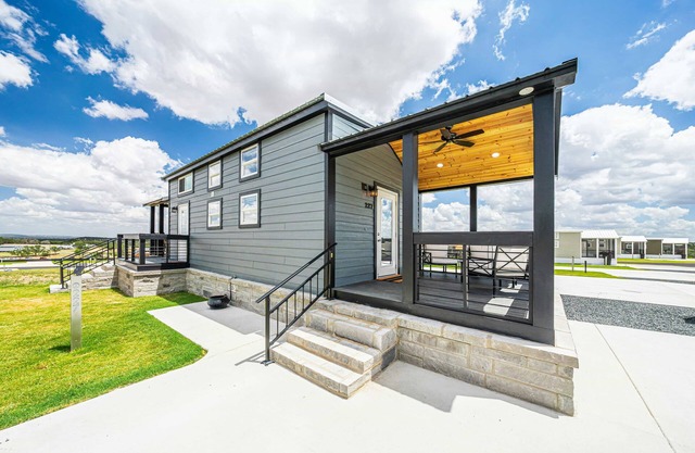 Pet-Friendly 'Tiny Treasure' Features Loft Sleeping Space and Modern Kitchen with Prime Location for