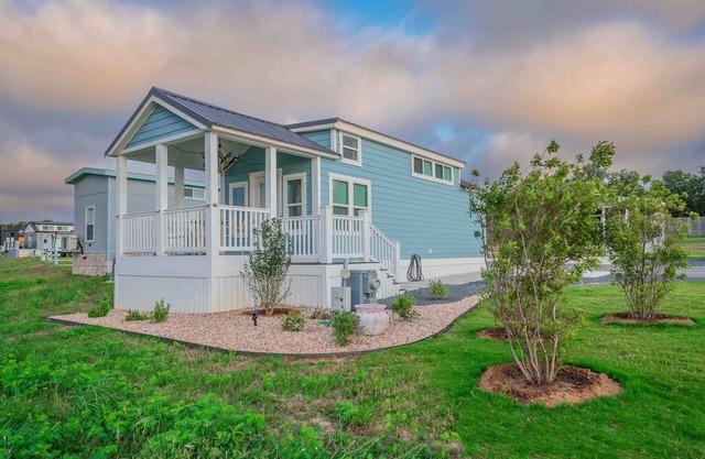 Pet-Friendly Vintage-Inspired Tiny Home 'Blue Skies' Features Pool Views, Built-in Dog Crate, and So