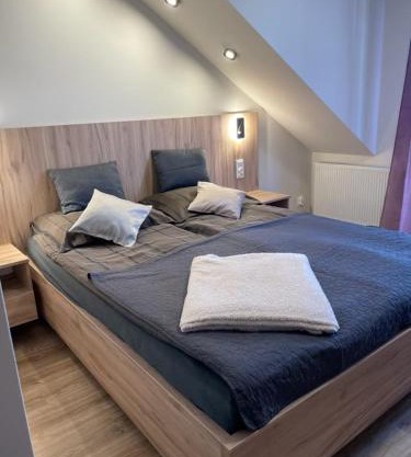 Pokoje i apartamenty nad Letniskową