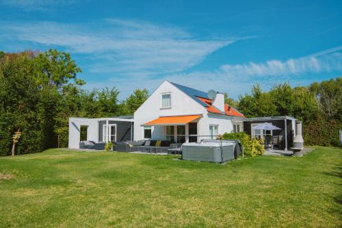 Poldersbos 3 - Ouddorp "BarLeDunes" - met jacuzzi en sauna