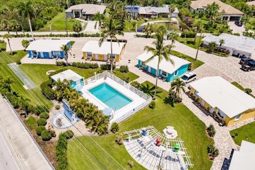 Poolside King Cottage with Kitchen - 10 Minutes to Beach!