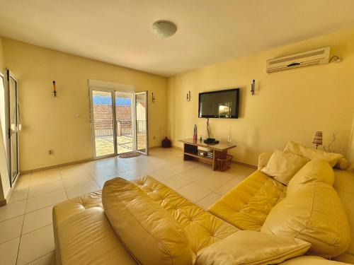Prcanj sunny port apartments with shared pool
