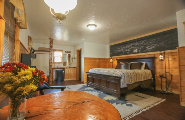 Indulge in a Premium King Room with Incredible Riverfront Access and Awe-Inspiring Mountain Views