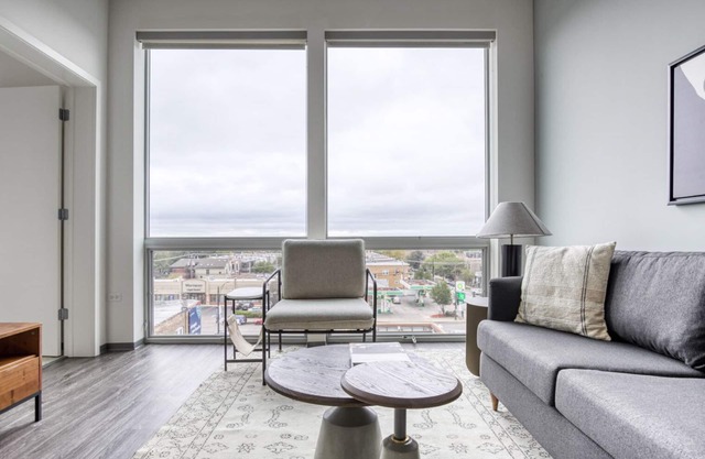 Premium Logan Square 1BR w/ Roof Deck & Gym, 1 block to L, by Blueground