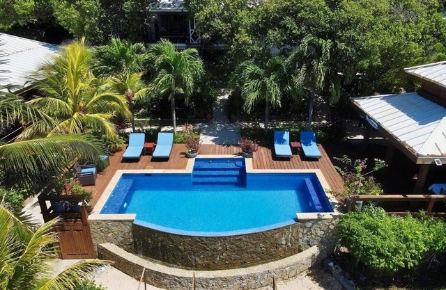 Pristine Reef steps away from Private Beach.