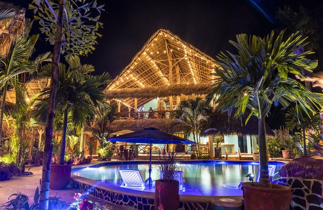 Private beach house paradise w/ private pool bar and game area.