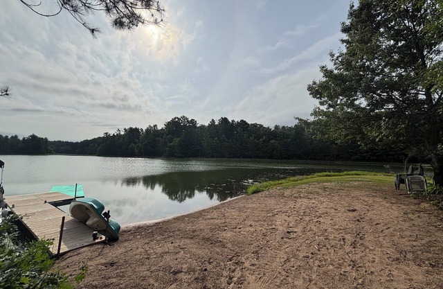 Private beach with dock on Pine Lake with spacious 3 bedroom home sleeps 9-12