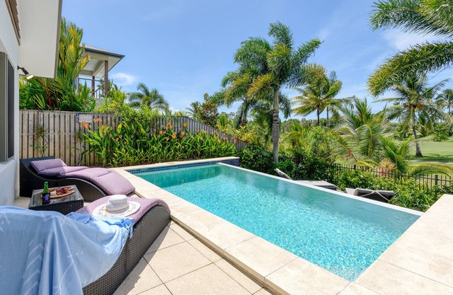 Private family home in gated estate overlooking golf course with heated pool