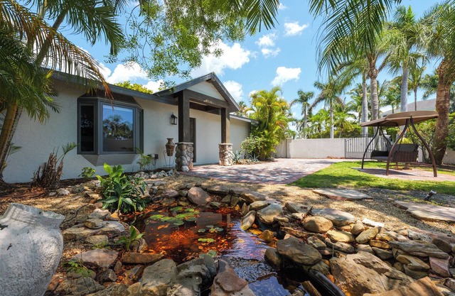 Casa tropical, muy privada y cerrada con piscina Corta caminata a St Armands y playa Lido
