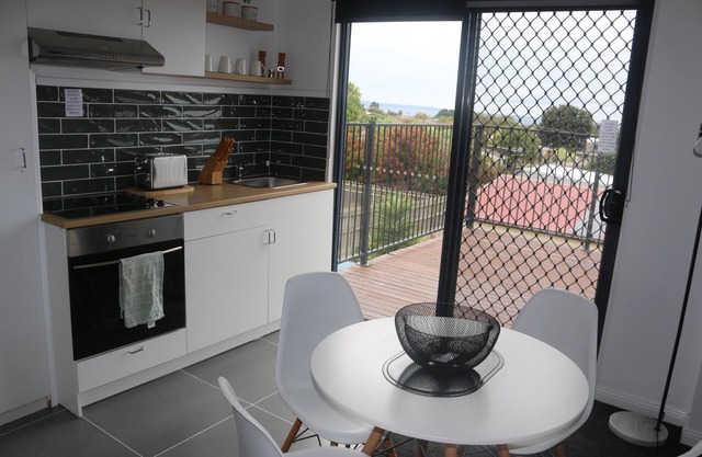 private Modern studio apartment with ocean views, balcony and Boat parking