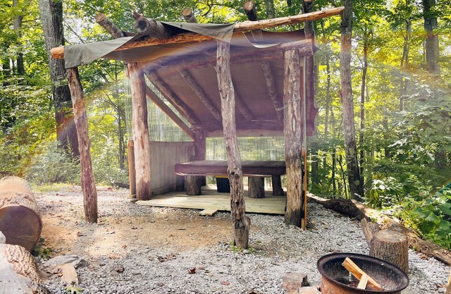 Private mountain top campsite. Wilderness feel yet convenient to Asheville.