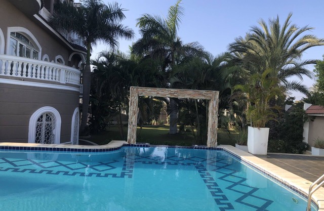 Private resort type condo setting with full access to garden and pool