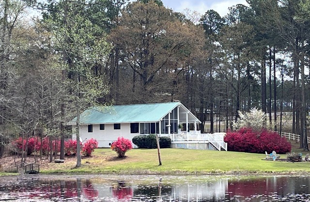Private Retreat! 200 private gated acres with two ponds.