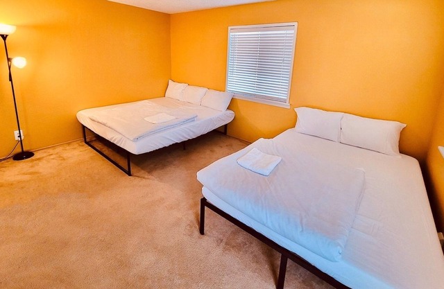 Private Room [#2] - King & Queen Beds - Shared Bathroom