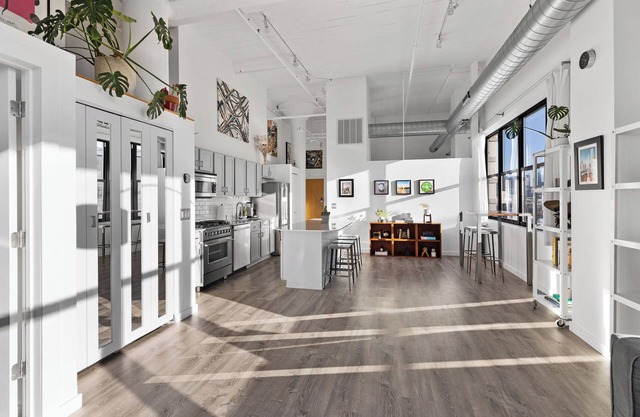 Private Room + Bathroom In Historic Luxury Loft w Skyline Views & Balcony