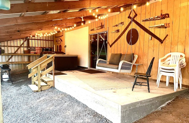 Private setting in town with hot tub and fire pit! Unique, vintage decor!